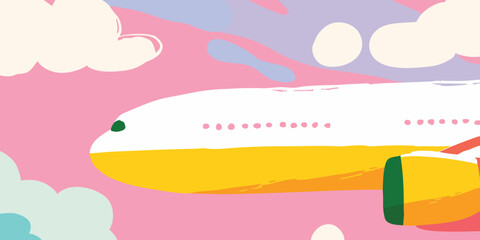 Fototapeta premium An eye-level shot of a commercial aircraft soars majestically through the fluffy clouds, with the vibrant sky filled with hues of pastel.