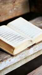 Obraz premium Open book resting on wooden steps