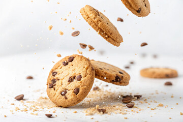 Delicious looking chocolate chip cookies with a hint of cinnamon. Lots of chocolate. White background.