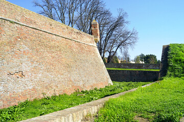 Landscape from Belgrade Fortress with brick defensive wall and watchtower for sentries. Journey through the historical places of southeastern Europe: fairytale architecture of Kalemegdan in Serbia. © tanyatorgonskaya