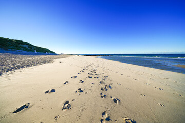 Landscape on the west beach near Hörnum on the island of Sylt. View of the North Sea coast.
