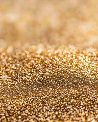 Close-up of sparkling golden glitter texture