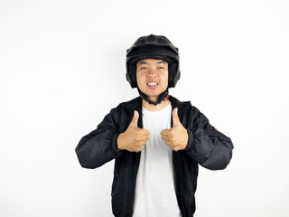 Young Asian man wearing motorbike helmet giving 
