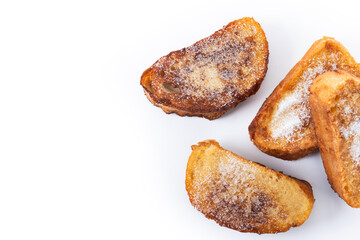 Traditional Spanish torrijas for Holy Week isolated on white background. Top view. Copy space