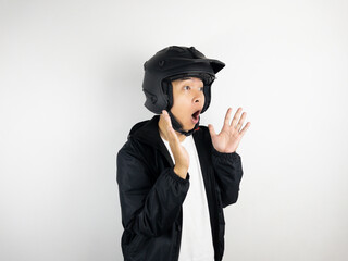 Shocked asian man riding a motorcycle. Isolated on white background