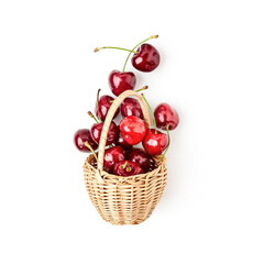 Cherry in basket photography isolated on white background. Clipping path. Original shadow.