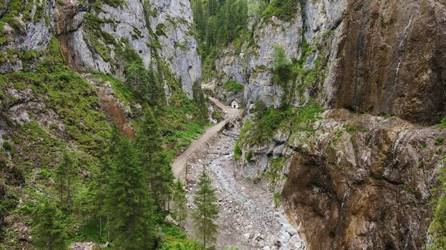 Majestic canyon landscape reveals ancient church tucked into Italy mountain pass