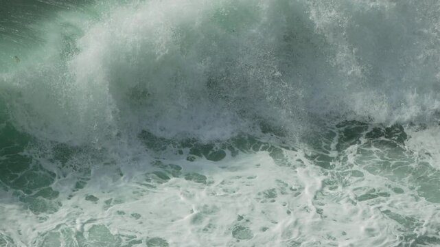 Ocean Wave Crashing, Water Power, Abstract. Sea wave breaks turbulently during daytime, creating foam because of natural forces