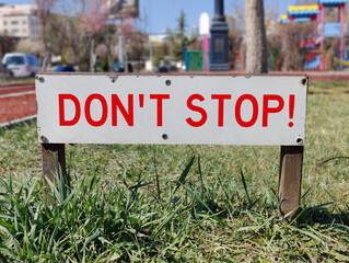 Fototapeta premium Don't Stop!: Persist Through the Storm - A Metaphorical Rally to Endurance on This Vibrant Path, Where Nature and Urban Life Converge, Igniting Willpower, Strength, and Hope Under the Open Sky