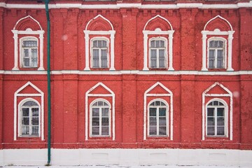 A wall with windows of an old 18th century house
