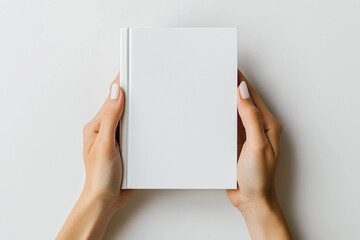 Female hand holding a white book, Book cover mockup, White background