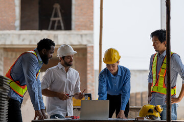 Construction engineers supervising progress of construction project. engineering or worker in...