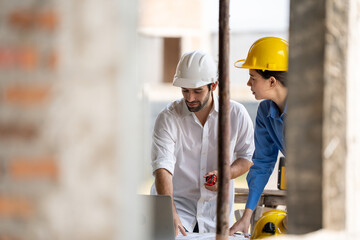 Construction engineers supervising progress of construction project. engineering or worker in...