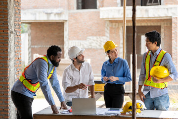 Construction engineers supervising progress of construction project. engineering or worker in...