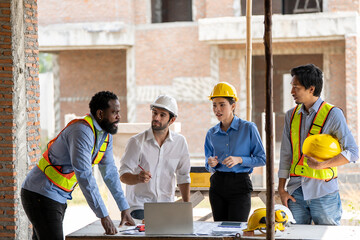 Construction engineers supervising progress of construction project. engineering or worker in...