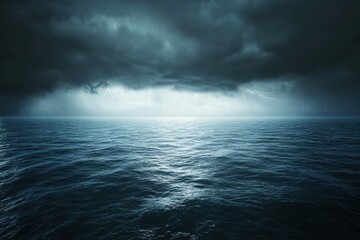 Naklejka premium Oceanic Majesty: Capturing the serene yet imposing beauty of the ocean under a dramatic sky, the vast expanse of water stretches towards the horizon under a canopy of stormy clouds.