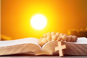 Holy Bible book and Christian cross