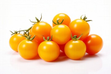 A group of ripe, yellow tomatoes on a white background.