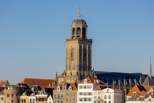 Architecture traditional houses, The Great Church or St. Lebuinus Church tower on harbor of IJssel river, Deventer is a city and municipality in the Salland region of Overijssel province, Netherlands.