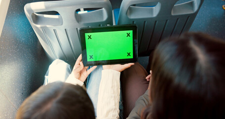 Hand, people and tablet with green screen in bus, travel and user experience with tracking marker. Passengers, above and digital and ui display with app, mock up space and contact on public transport