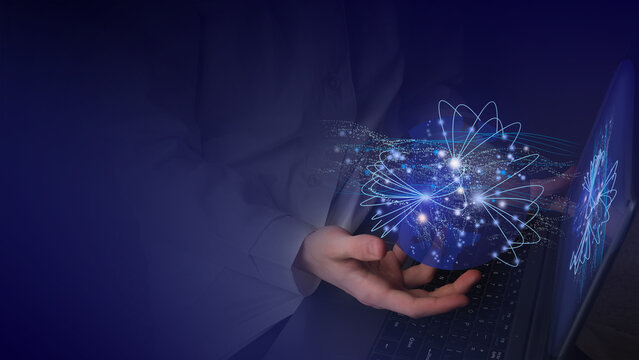 Virtual reality of big data of global processes on the planet wich keep human hand under laptop keyboard against device screen.