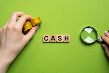 Cash word concept. Physical money in the form of coins and paper bills that is used as a medium of...
