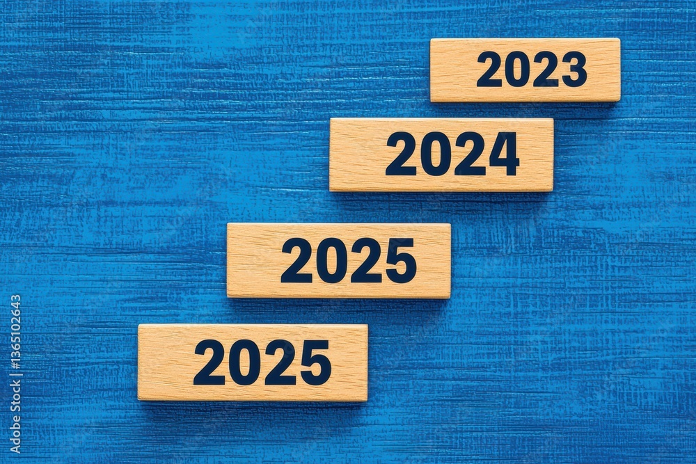Aufkleber stacked wooden blocks displaying 2023 to 2025 on textured blue surface representing time progress fu