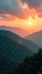 Silhouettes of green-covered hills in mist at sunset viewed from above by a vertical drone shot, drone,  vertical