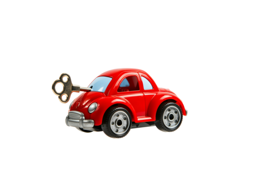 A floating toy wind-up car with its key inserted, isolated on a solid white background.