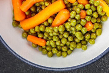Green peas and carrot canned food tasty fresh delicious gourmet food background table rustic food top view copy space keto and paleo diet vegetarian and vegan food