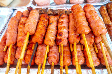 Nem lui fue, grilled minced pork sausages on lemongrass skewers, Vietnamese cuisine