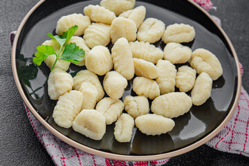 Gnocchi tasty fresh delicious gourmet food background table rustic food top view copy space keto and paleo diet vegetarian and vegan food