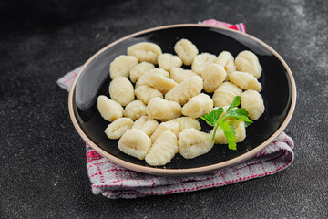 Gnocchi tasty fresh delicious gourmet food background table rustic food top view copy space keto and paleo diet vegetarian and vegan food