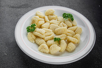 Gnocchi tasty fresh delicious gourmet food background table rustic food top view copy space keto and paleo diet vegetarian and vegan food