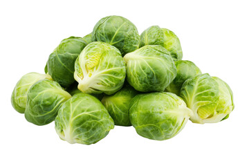 Fototapeta premium Fresh green brussels sprouts pile on black background, cut out