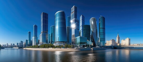 Modern cityscape reflecting on water