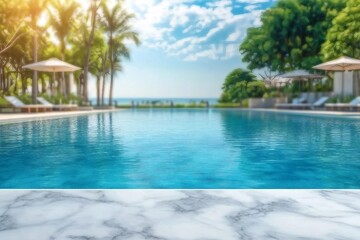 Fototapeta premium white marble top with blurred empty Swimming pool background can be used for mocking up or display product to make advertising.