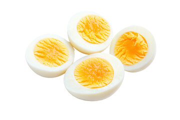 Halved boiled eggs displaying bright yellow yolks, cut out