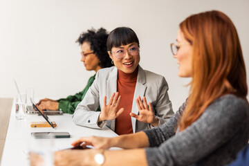 Business Team Discussing Concepts in a Modern Office Environment