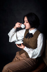 Naklejka premium Elegant Female Detective Drinking Tea or Coffee