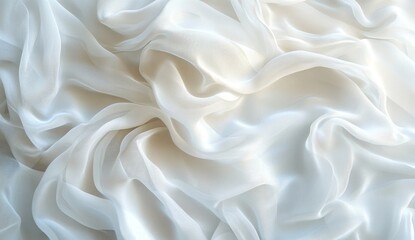 Fototapeta premium Smooth, flowing, white fabric drapes in elegant folds