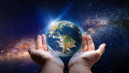 hand holding earth