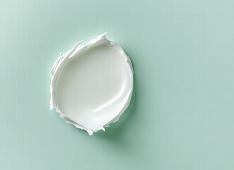 white cream drop on pastel green background, skincare product texture, beauty product mockup, moisturizing cream