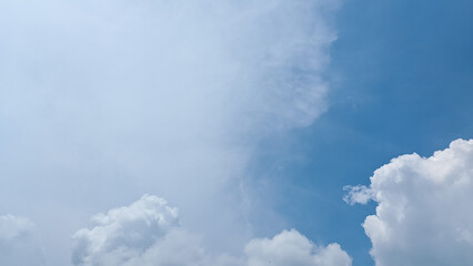 Stratus clouds dance across the sky in the afternoon, their shapes intricate and distinct. Cotton tufts of cumulus clouds intertwine with stratus, smooth expanses of stratus clouds