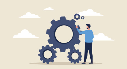 Man working on large gears, system concept