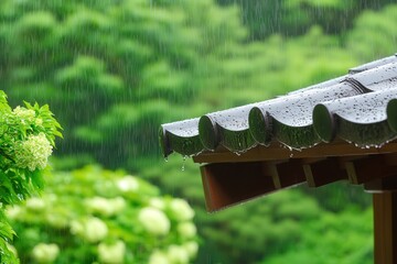 A serene view of rain falling on a traditional roof, surrounded by lush green foliage, highlighting the beauty of nature and tranquility.