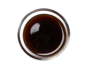 Soy sauce in glass bowl isolated on white