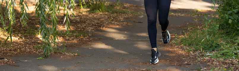 Jogging woman running in park