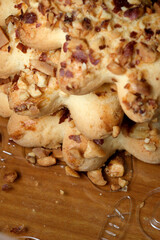 Delicious baked treats topped with crunchy nuts in a cozy kitchen setting