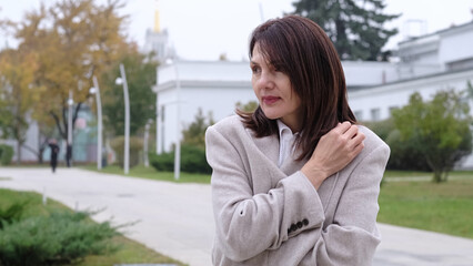 Fototapeta premium A thoughtful portrait of a mature woman, symbolizing the quiet battles with depression and the search for inner peace in later life.